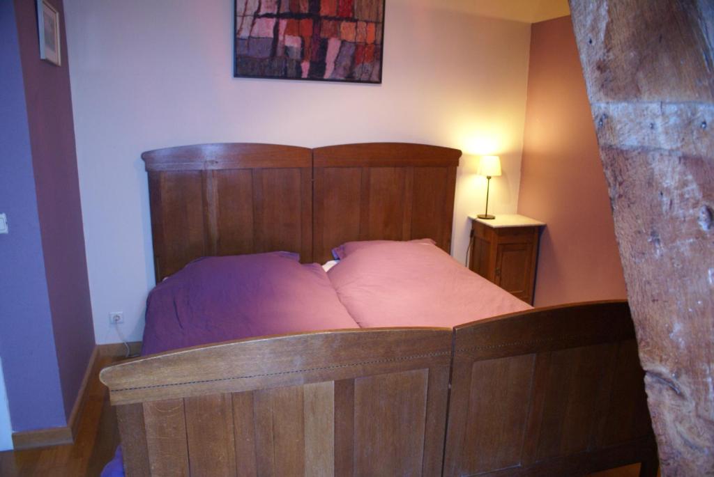 Postel nebo postele na pokoji v ubytování B&B De Metstermolen