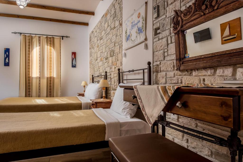 Postel nebo postele na pokoji v ubytování Cretan Villa Hotel