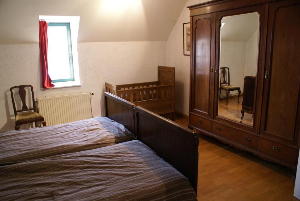 Postel nebo postele na pokoji v ubytování B&B De Metstermolen