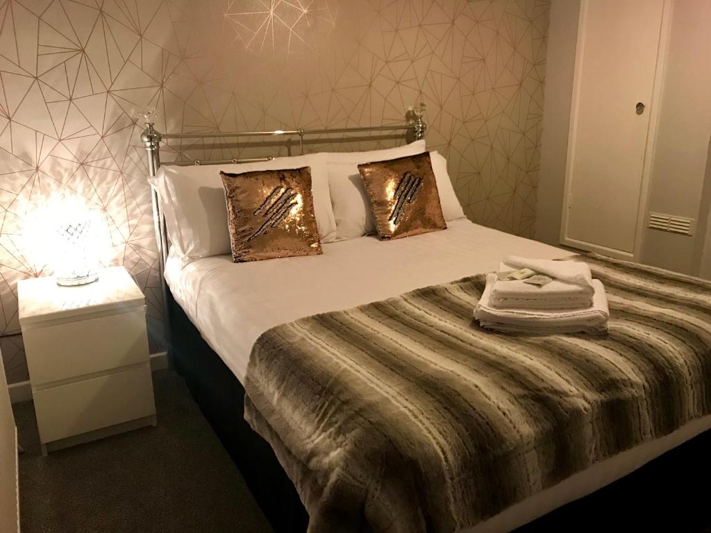 Postel nebo postele na pokoji v ubytování Marina Court