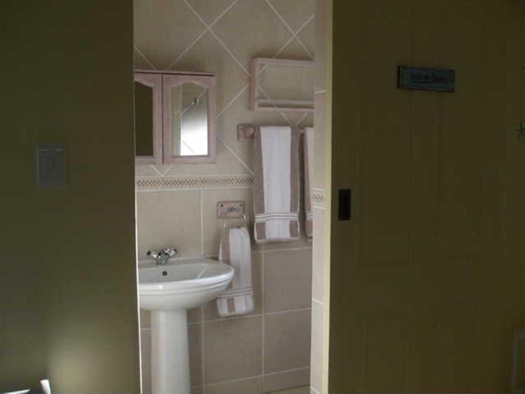 Ένα μπάνιο στο Bienvenue Self Catering