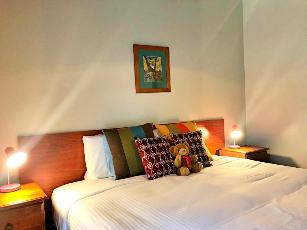 Postel nebo postele na pokoji v ubytování Grange Motel