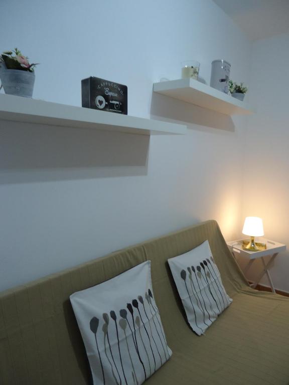 A bed or beds in a room at Apartamento Céntrico Lobos