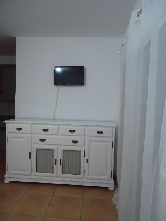 A television and/or entertainment centre at Apartamento Céntrico Lobos
