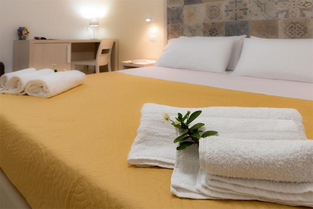 Posteľ alebo postele v izbe v ubytovaní Doride b&b