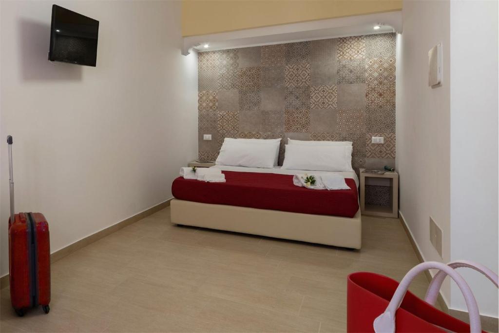 Posteľ alebo postele v izbe v ubytovaní Doride b&b
