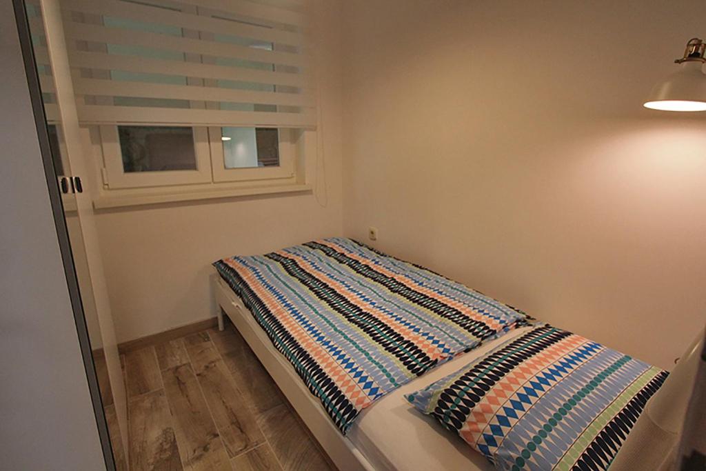 Posteľ alebo postele v izbe v ubytovaní Apartment Christian