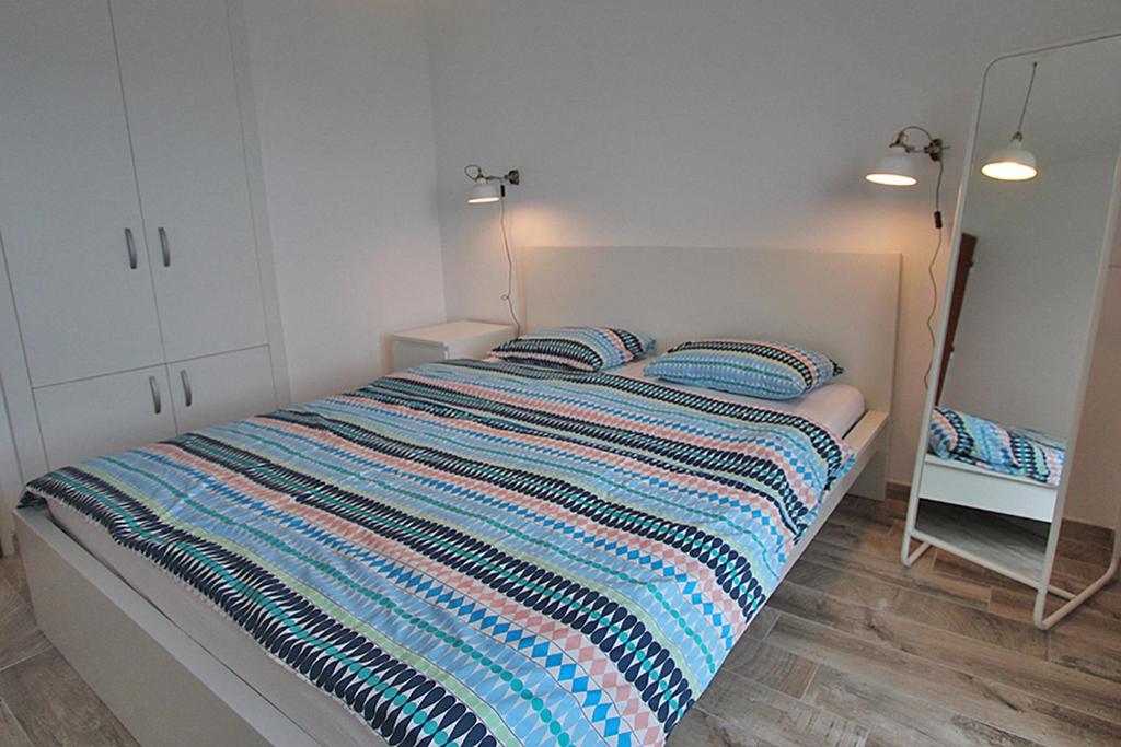 Posteľ alebo postele v izbe v ubytovaní Apartment Christian