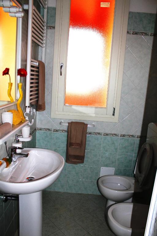 A bathroom at Airone Bianco Residence Village