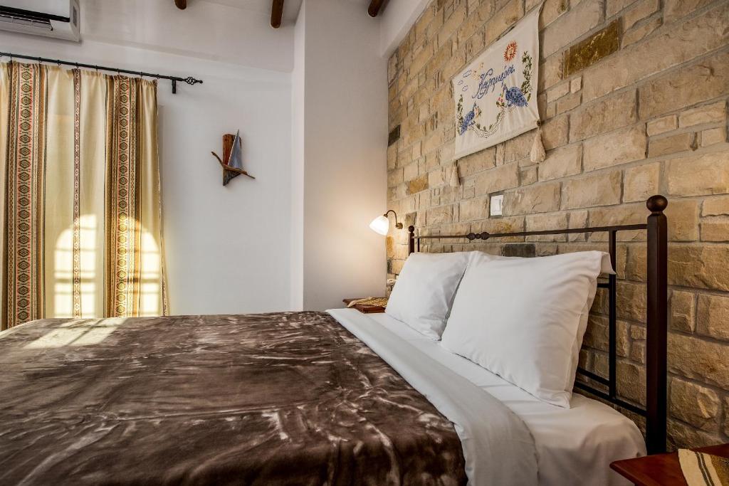 Postel nebo postele na pokoji v ubytování Cretan Villa Hotel