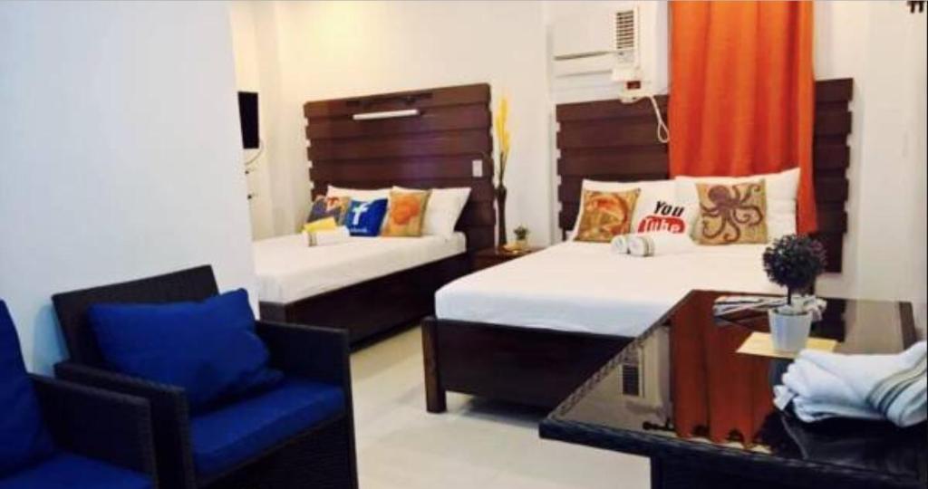 Postel nebo postele na pokoji v ubytování SunValley Tourist Inn