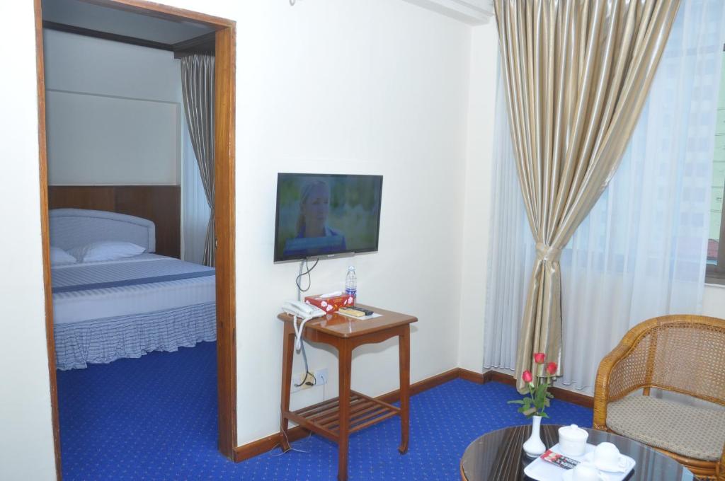 Postel nebo postele na pokoji v ubytování Panorama Hotel