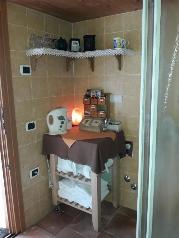 Kuchyň nebo kuchyňský kout v ubytování Room & Breakfast Cà mea Dina