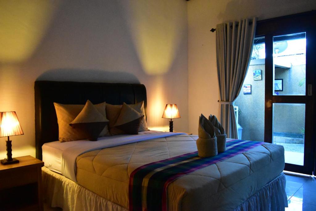 Postel nebo postele na pokoji v ubytování Meisya Cottage
