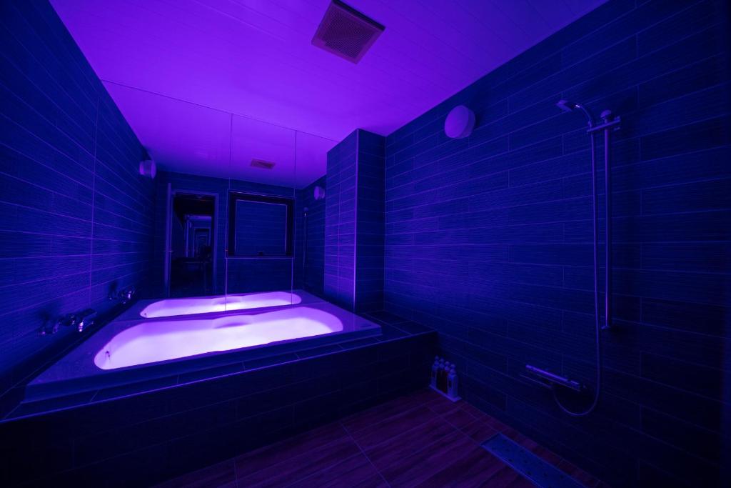 Postel nebo postele na pokoji v ubytování Hotel Noah Resort Sakuranomiya (Adult Only)