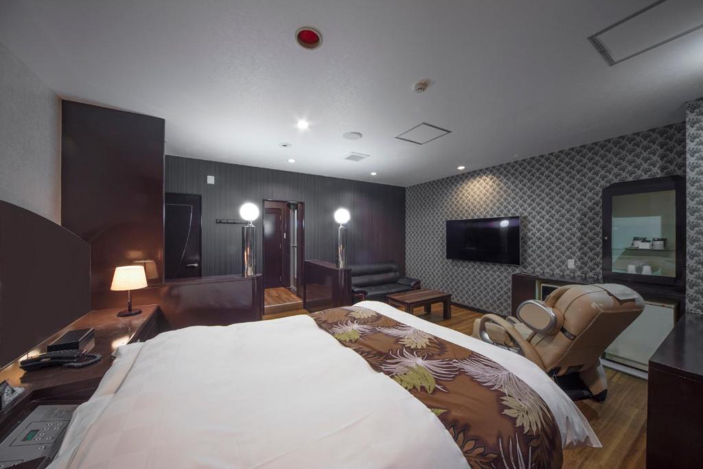 Postel nebo postele na pokoji v ubytování Hotel Noah Resort Sakuranomiya (Adult Only)