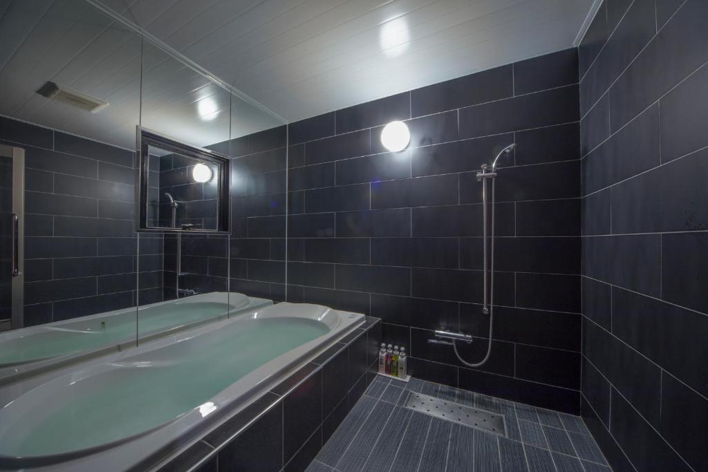 Koupelna v ubytování Hotel Noah Resort Sakuranomiya (Adult Only)