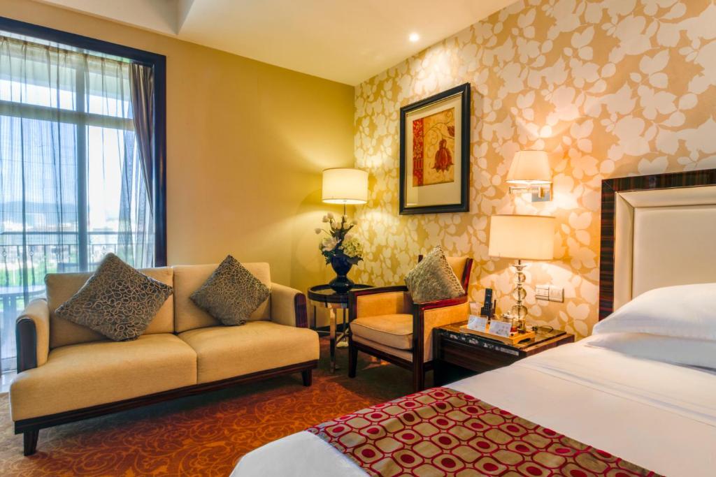 Postel nebo postele na pokoji v ubytování Country Garden Phoenix Hotel Huizhou Huiyang