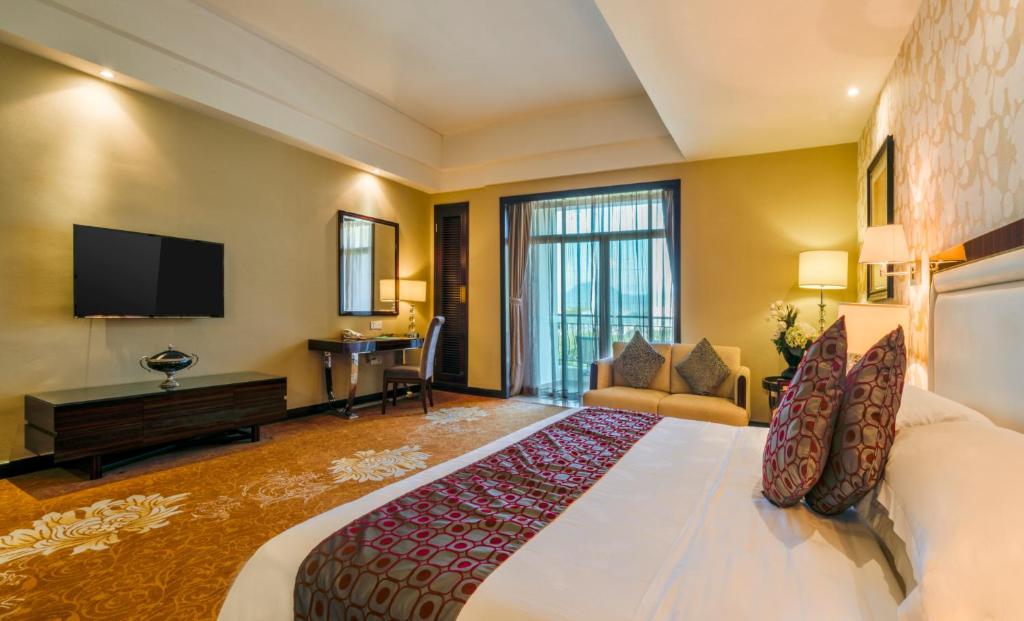 Postel nebo postele na pokoji v ubytování Country Garden Phoenix Hotel Huizhou Huiyang