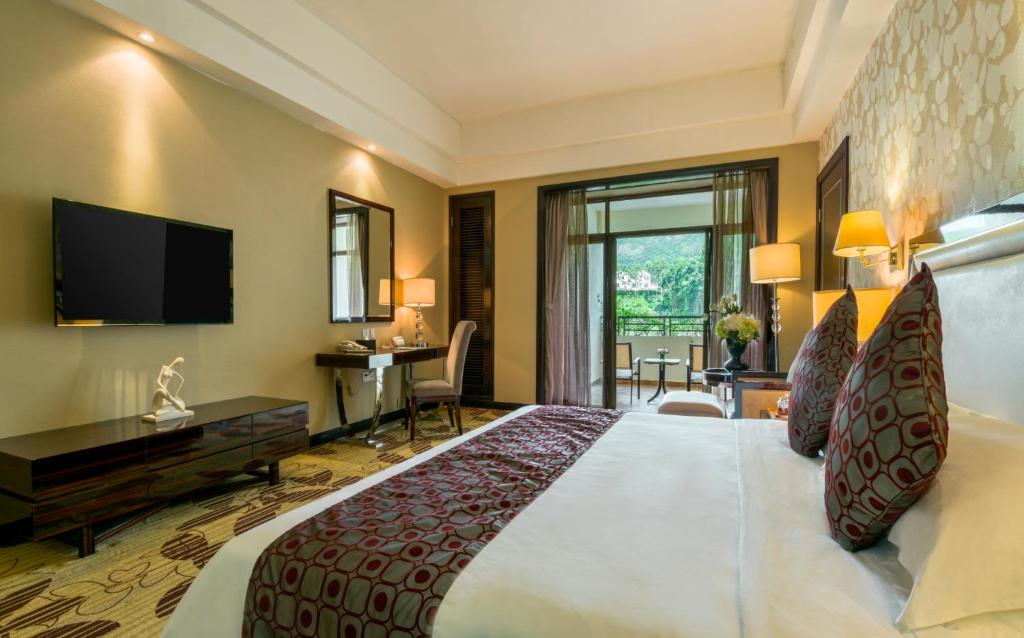 Postel nebo postele na pokoji v ubytování Country Garden Phoenix Hotel Huizhou Huiyang