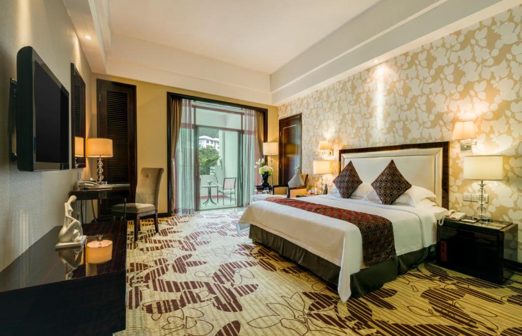 Postel nebo postele na pokoji v ubytování Country Garden Phoenix Hotel Huizhou Huiyang