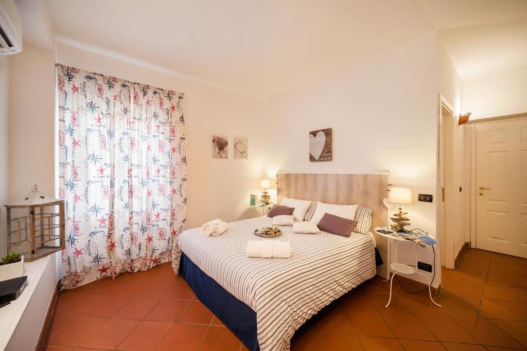 Кровать или кровати в номере CircEea Beach B&B