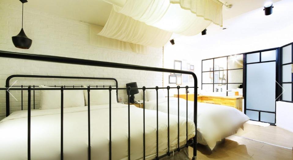 Postel nebo postele na pokoji v ubytování Hotel 25 Seomyeon