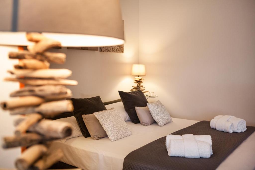 Кровать или кровати в номере CircEea Beach B&B
