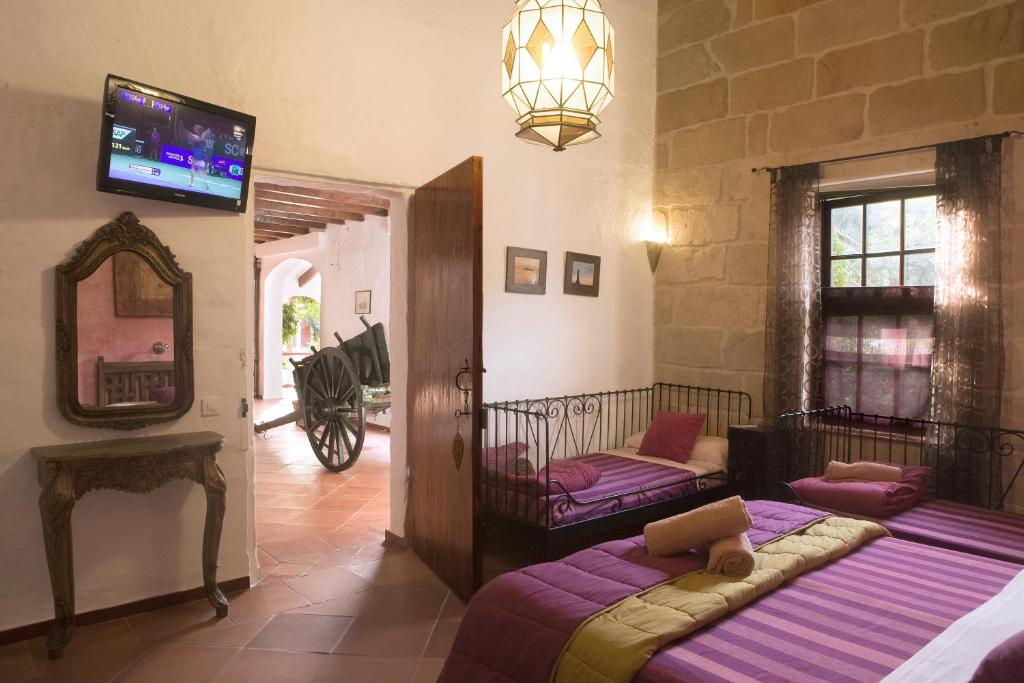 Postel nebo postele na pokoji v ubytování Agroturismo Matxani Gran