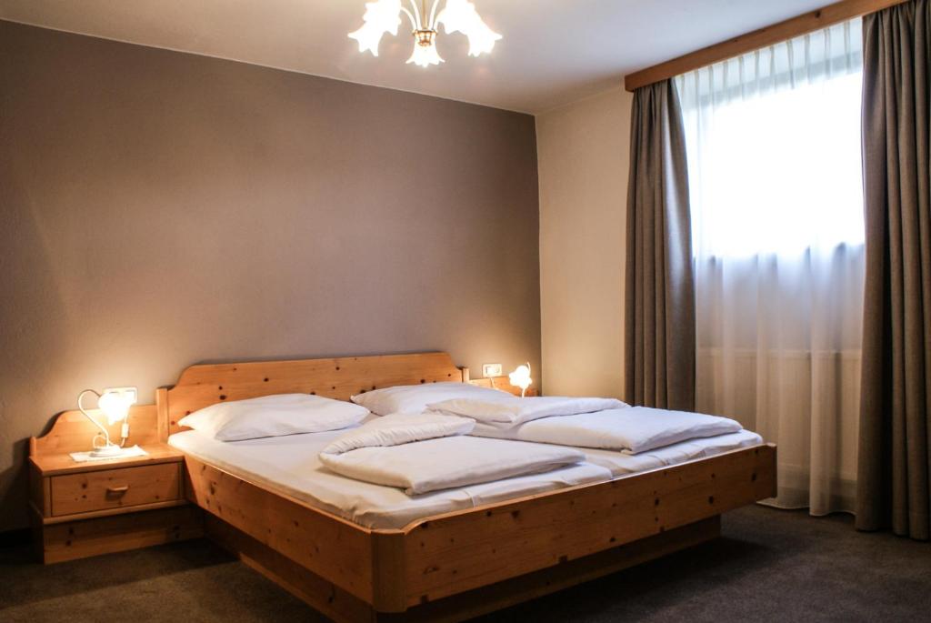 Postel nebo postele na pokoji v ubytování Gästehaus Prock