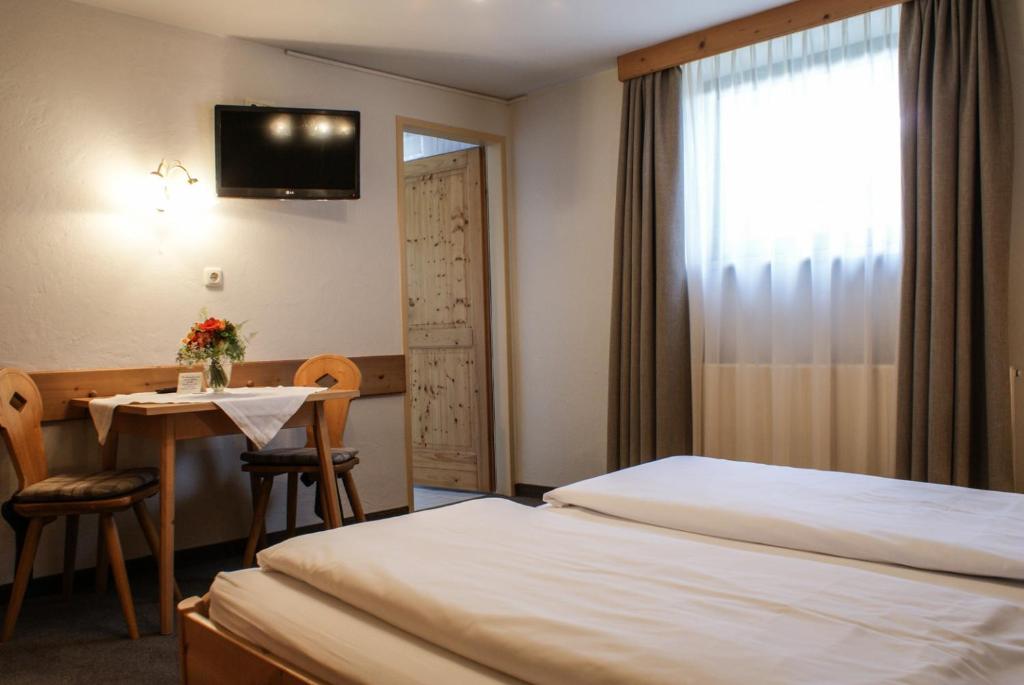 Postel nebo postele na pokoji v ubytování Gästehaus Prock