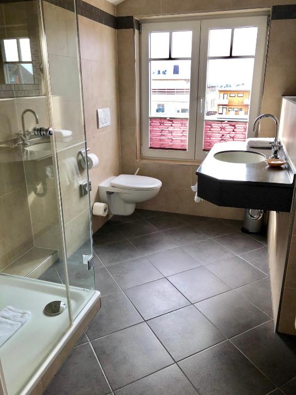 Koupelna v ubytování Hotel Sylter Blaumuschel