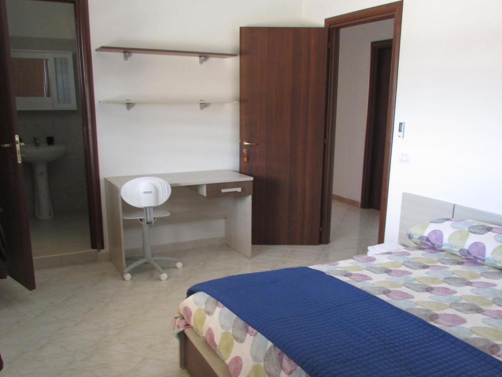 Postel nebo postele na pokoji v ubytování Ostello Bella Calabria