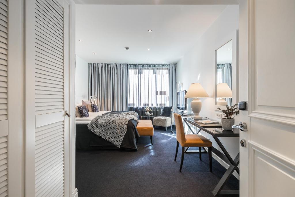 Voodi või voodid majutusasutuse Hotel Fabian toas