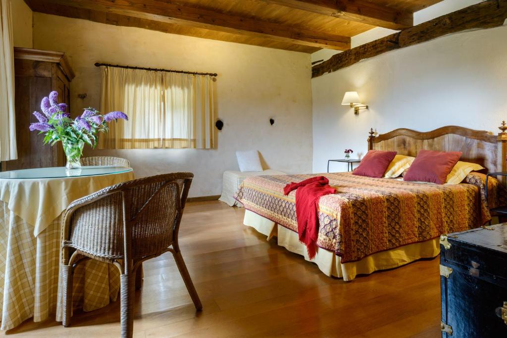 Postel nebo postele na pokoji v ubytování Hotel Akerreta