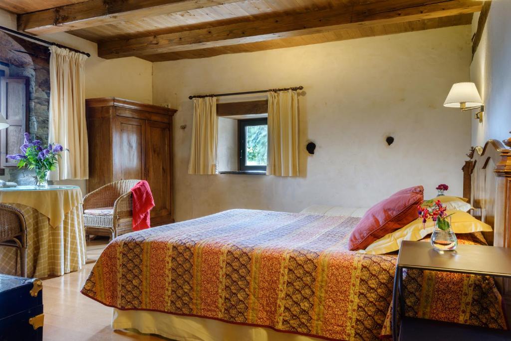 Postel nebo postele na pokoji v ubytování Hotel Akerreta