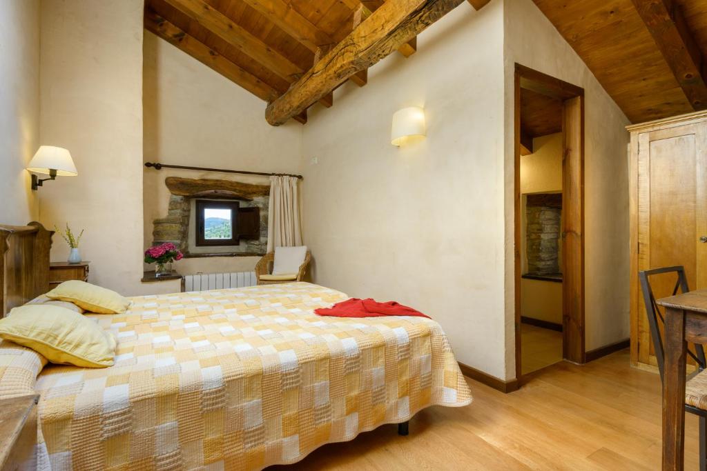 Postel nebo postele na pokoji v ubytování Hotel Akerreta