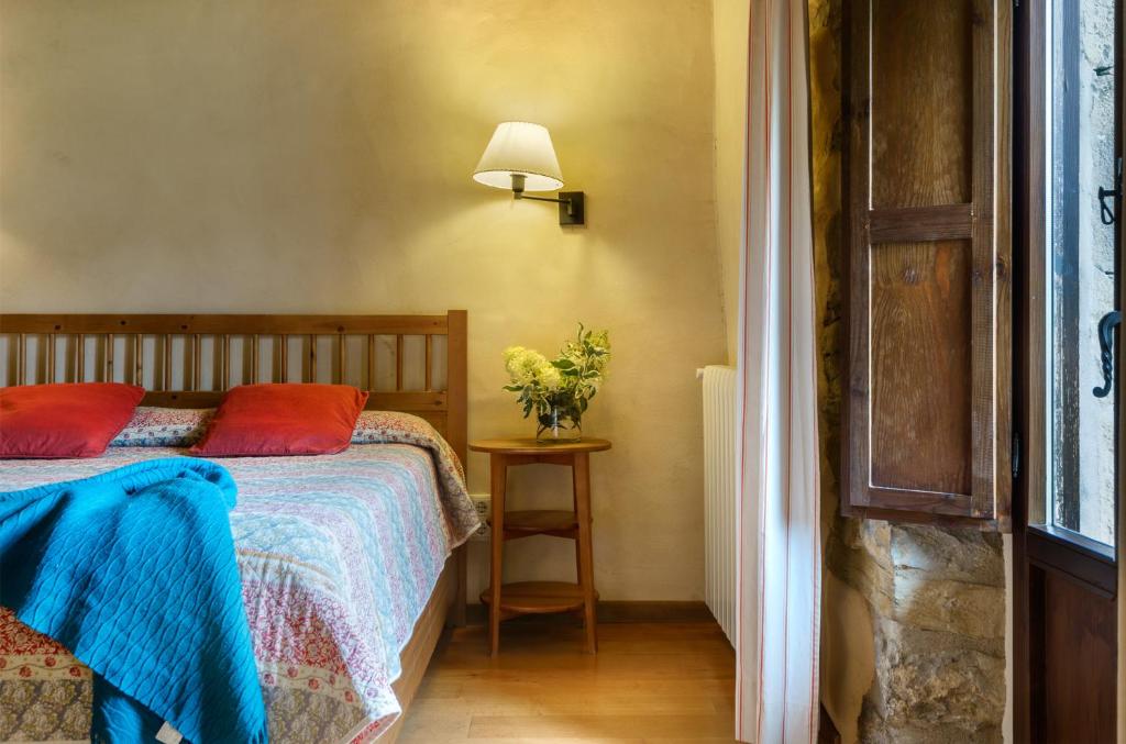 Postel nebo postele na pokoji v ubytování Hotel Akerreta