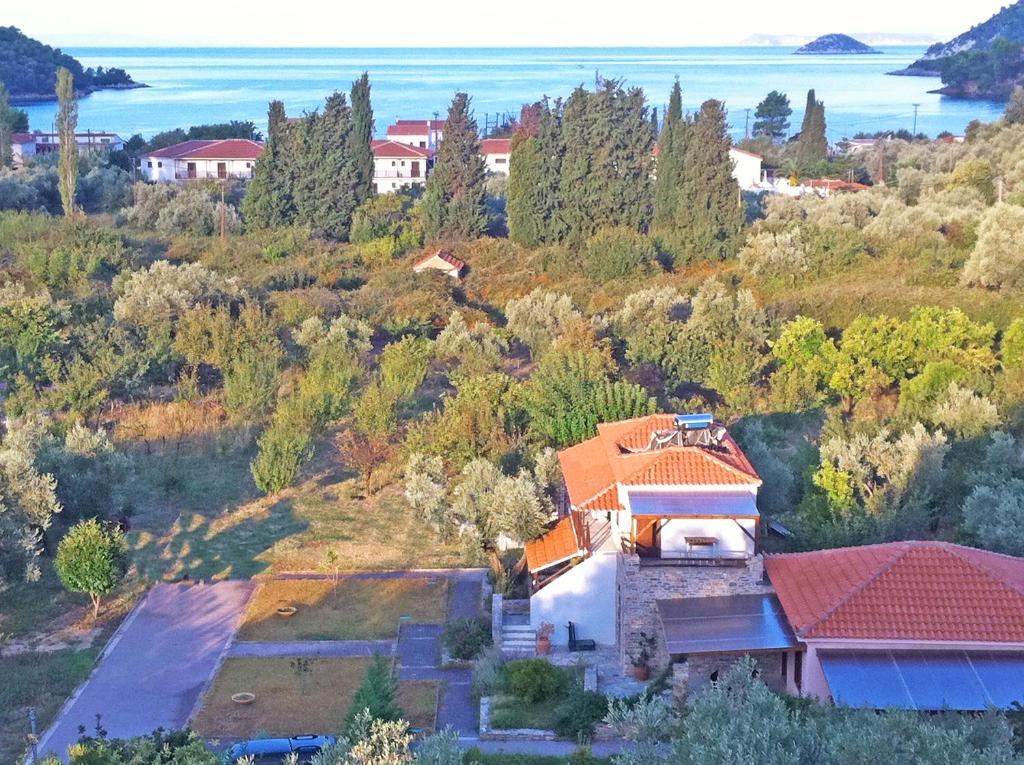 an aerial view of a house on a hill at Ktima Kehrioti in Panormos Skopelos
