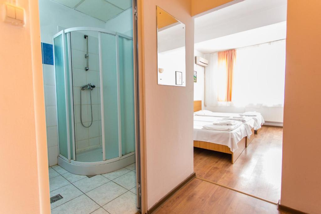 Postel nebo postele na pokoji v ubytování Hostel Horia