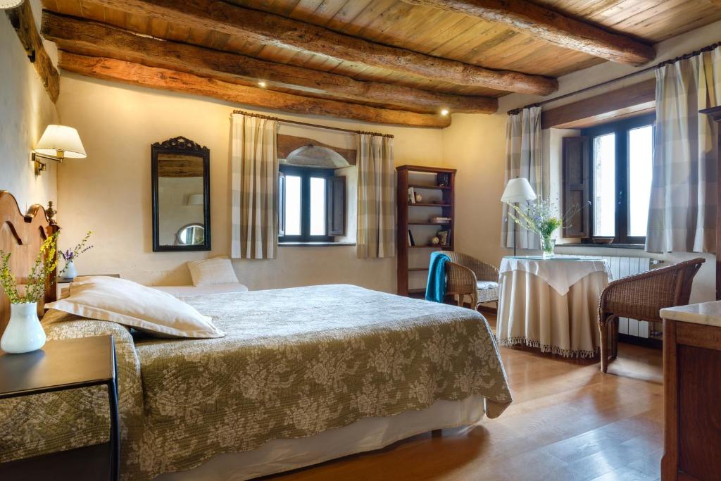 Postel nebo postele na pokoji v ubytování Hotel Akerreta
