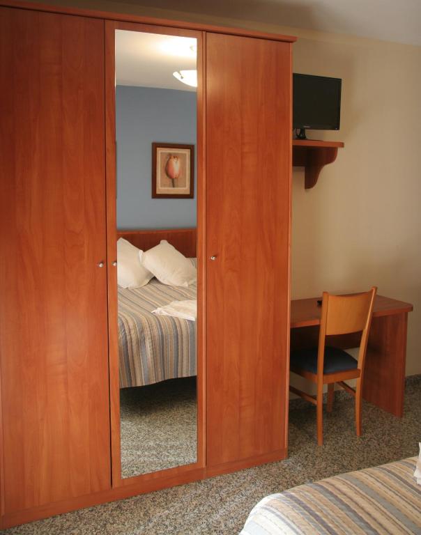 Postel nebo postele na pokoji v ubytování Hostal Casa Barranco