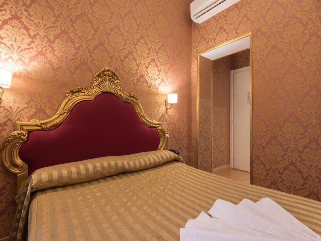 Postel nebo postele na pokoji v ubytování DCBoutiqueHotel