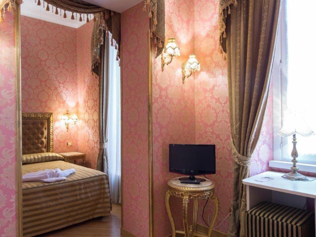 Postel nebo postele na pokoji v ubytování DCBoutiqueHotel