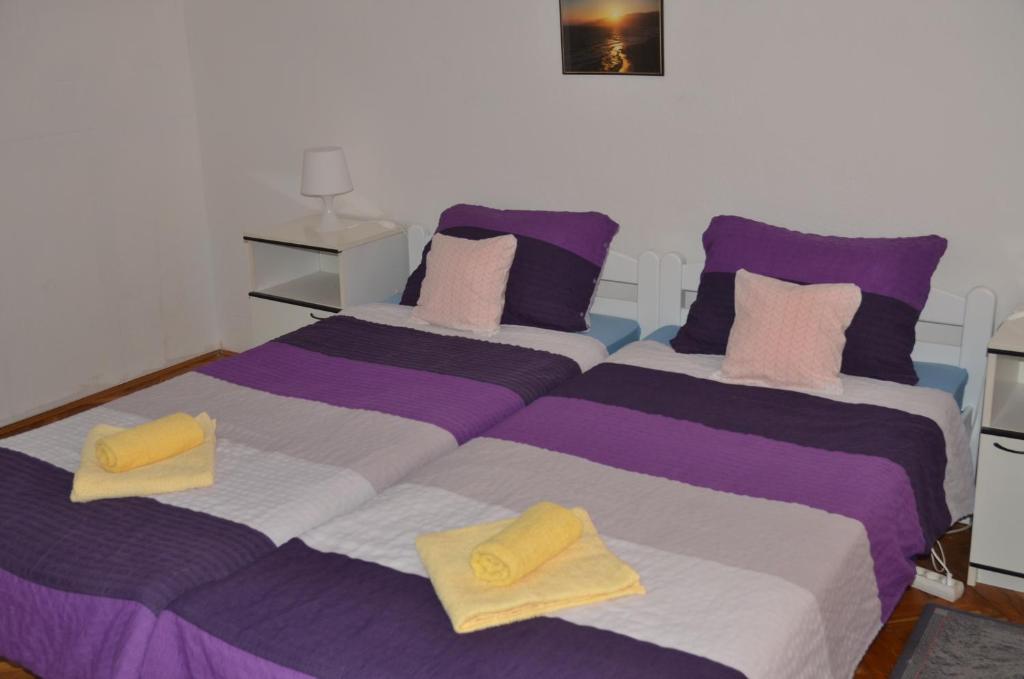 Posteľ alebo postele v izbe v ubytovaní Rooms Mila