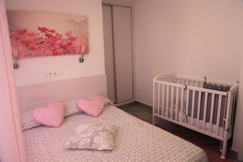 Postel nebo postele na pokoji v ubytování Apartamento Solmar Playa de Gandía