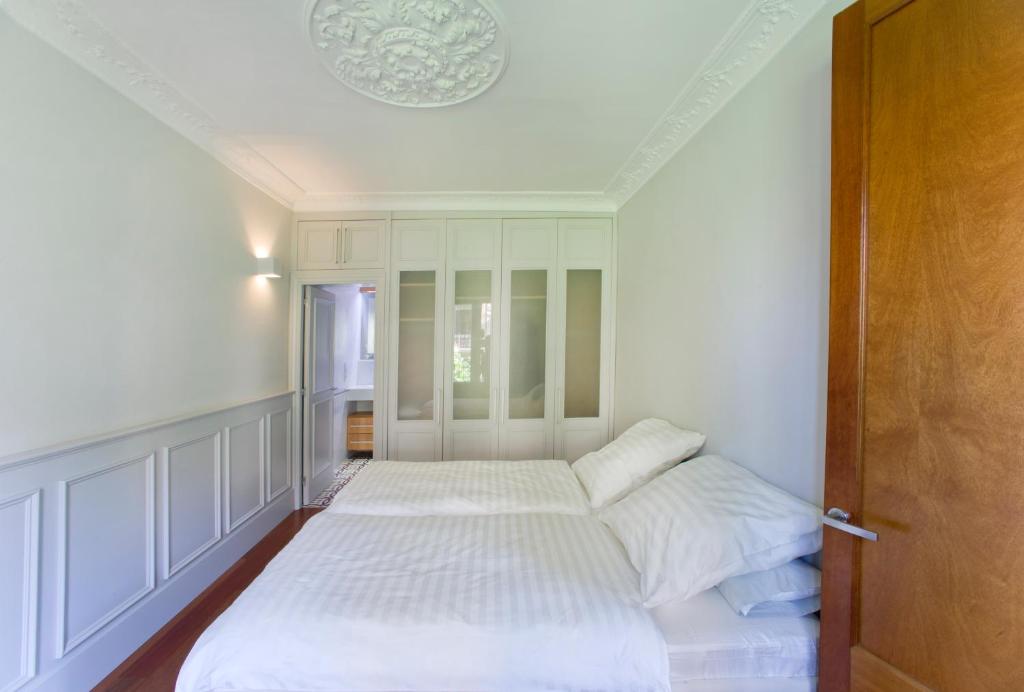 Postel nebo postele na pokoji v ubytování Montaber Apartment - Bailén