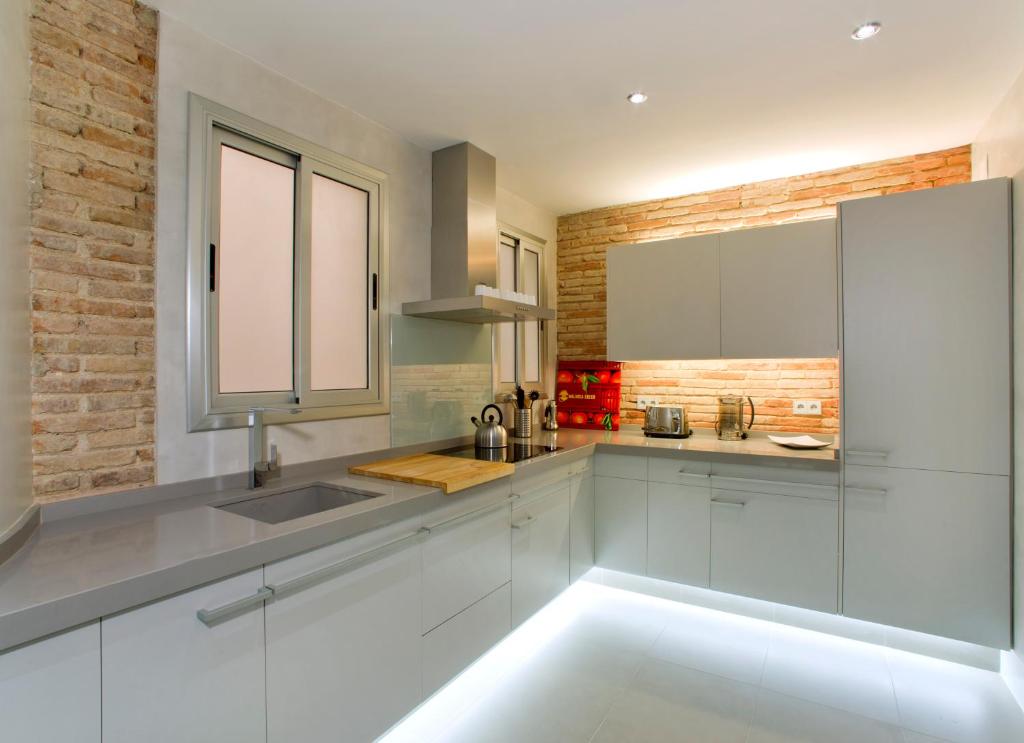 Kuchyň nebo kuchyňský kout v ubytování Montaber Apartment - Bailén