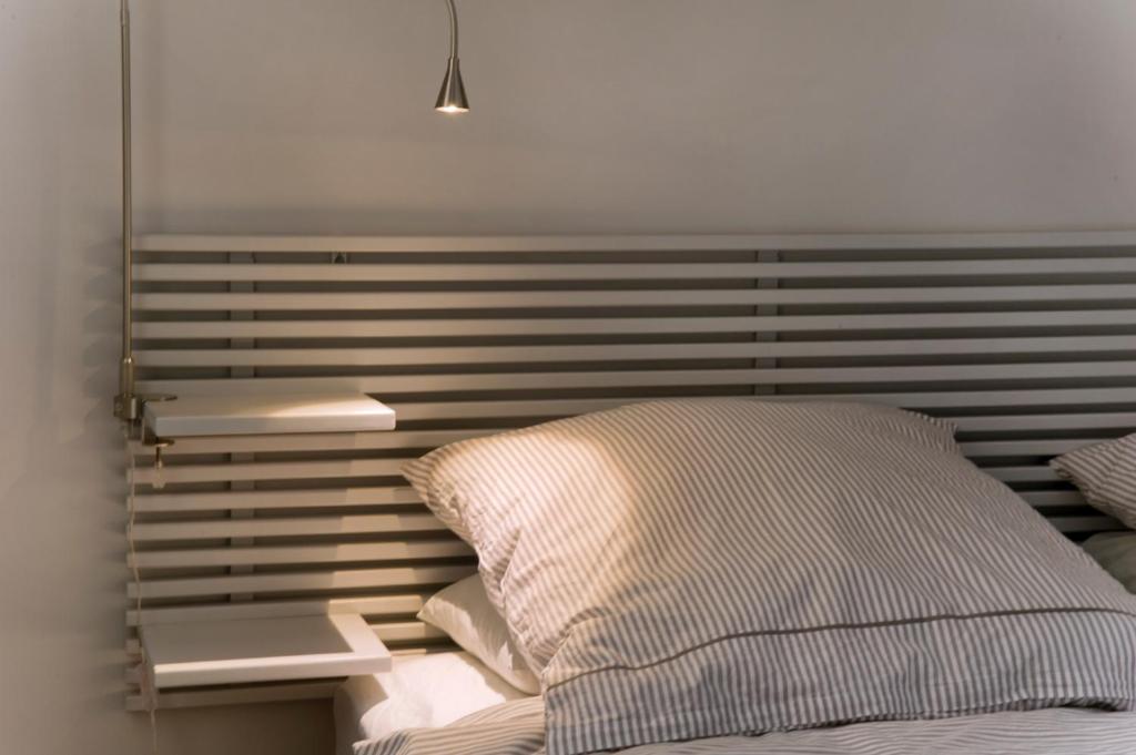 Postel nebo postele na pokoji v ubytování Montaber Apartment - Bailén