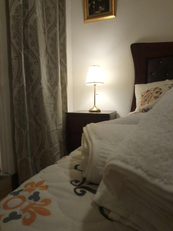 Postel nebo postele na pokoji v ubytování Tavalero Rooms